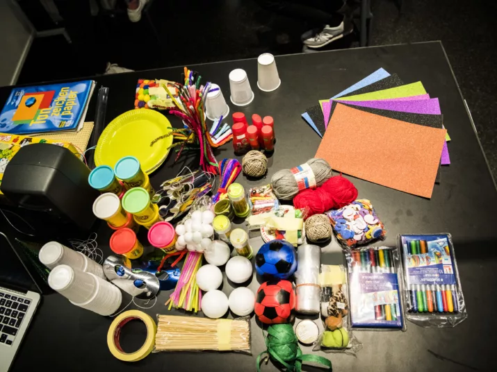 Craft materials lie on a table